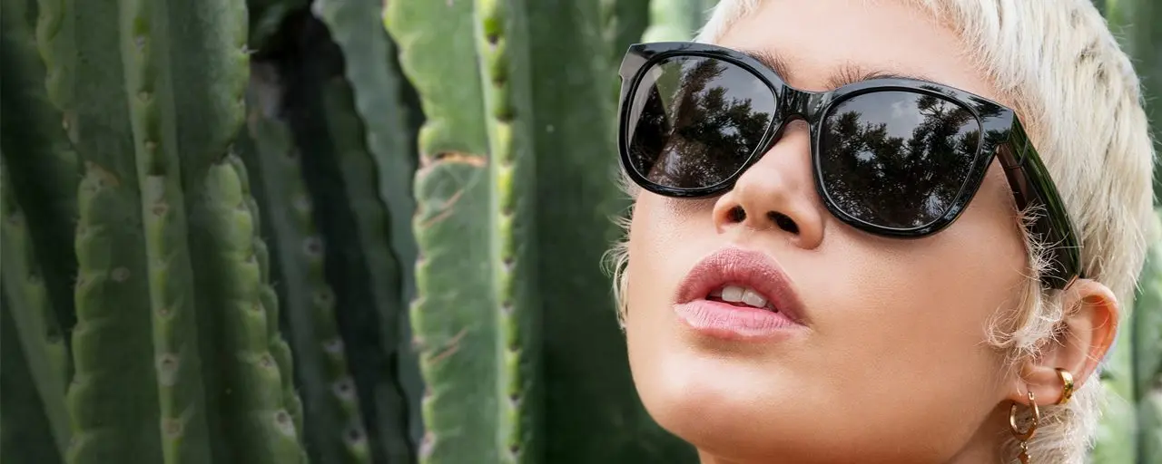 Girl wearing Bose Frames collection